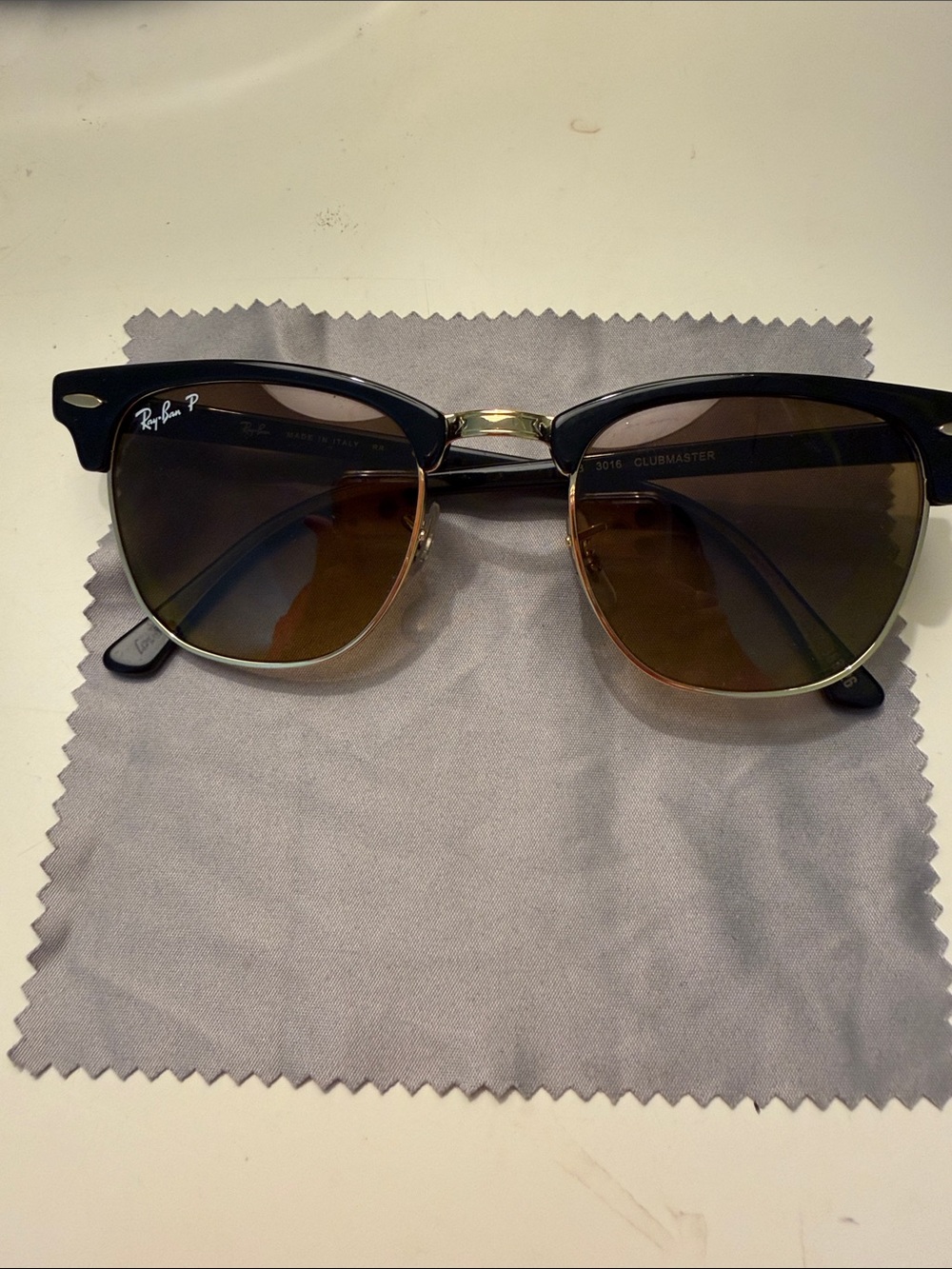 Ray-Ban polarized sunglasses worn once. Made in Italy